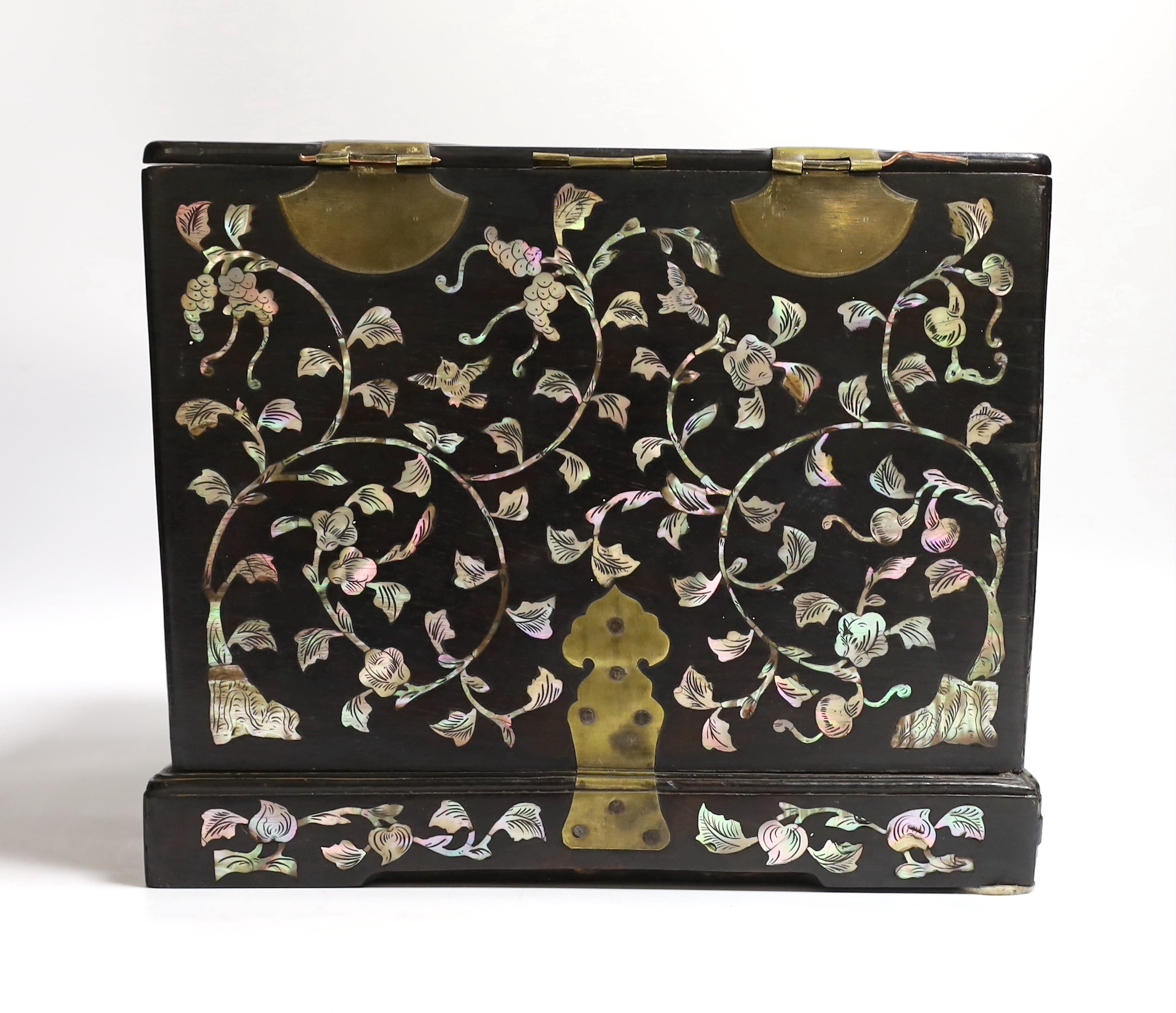 A Chinese mother-of- pearl inlaid hongmu vanity cabinet, late Qing dynasty, with fitted interior comprising a mirror, drawers, etc. 24cm x 31cm x 20cm